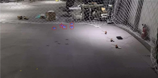 Drones surrounded by motion capture system